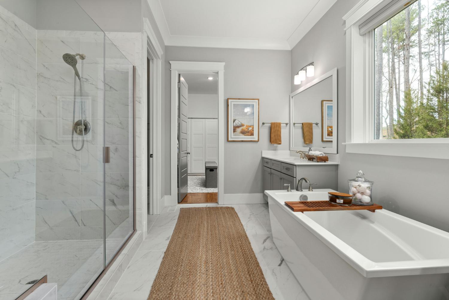spacious bathroom with double vanity and modern fixtures in Troutman, NC by Carolina Signature Custom Homes stock-optimized