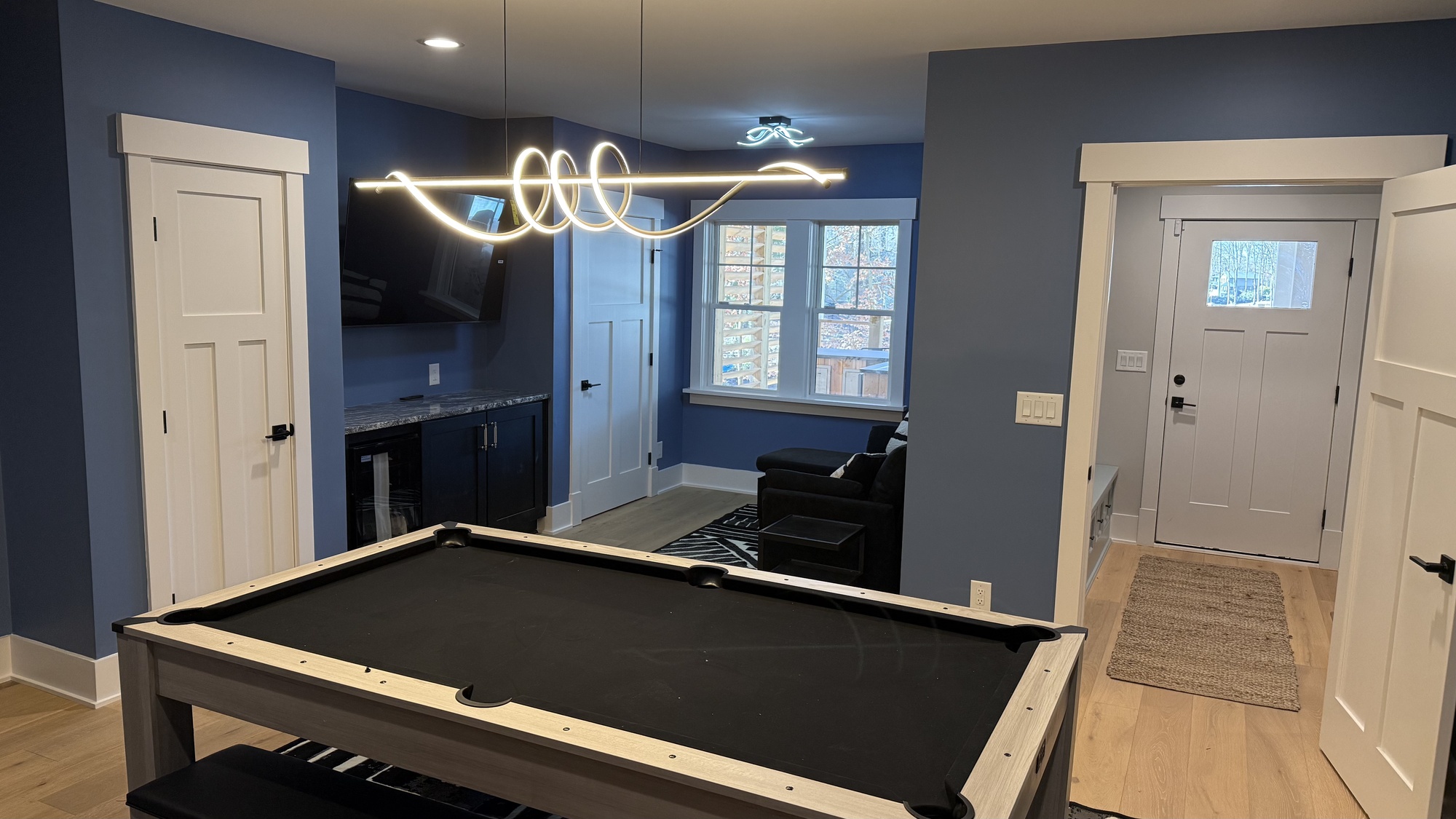 lake norman basement remodel pool table wet bar and lounge seating