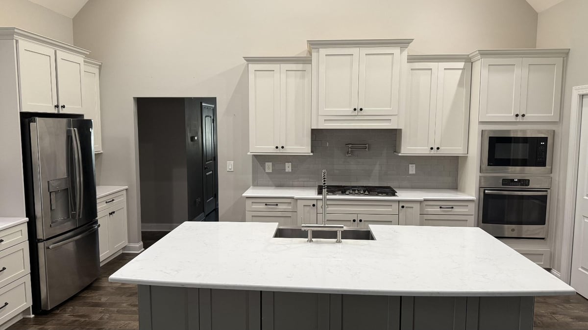 high-end kitchen remodel with island seating and modern finishes in Mt Ulla NC by Carolina Signature Custom Homes-optimized
