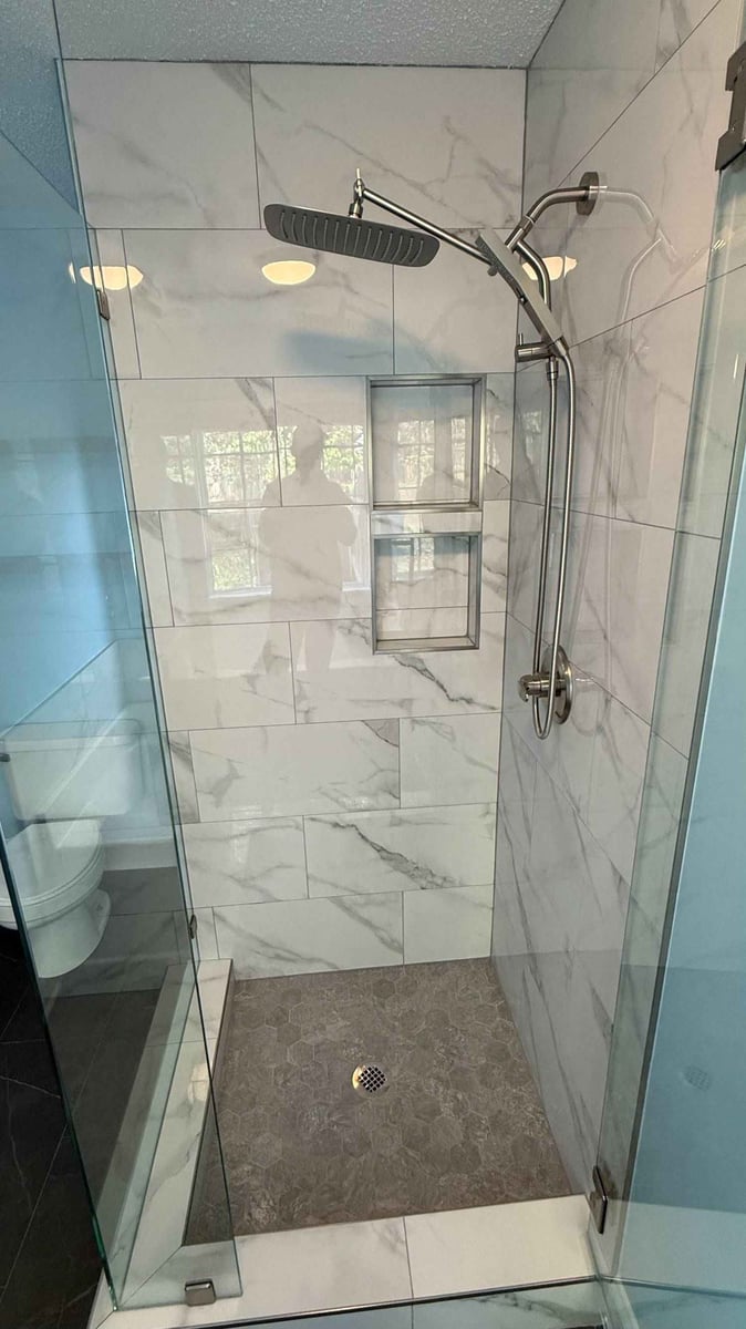 custom walk-in shower with glass enclosure and tile niche in Aitken Charlotte NC by Carolina Signature Custom Homes-optimized-optimized