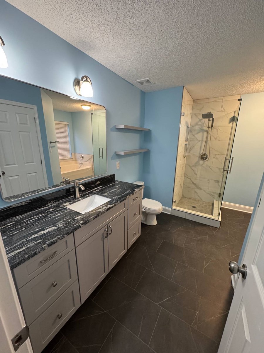 full bathroom remodel with double vanity and glass shower by Carolina Signature Custom Homes in Aitken Charlotte NC-optimized