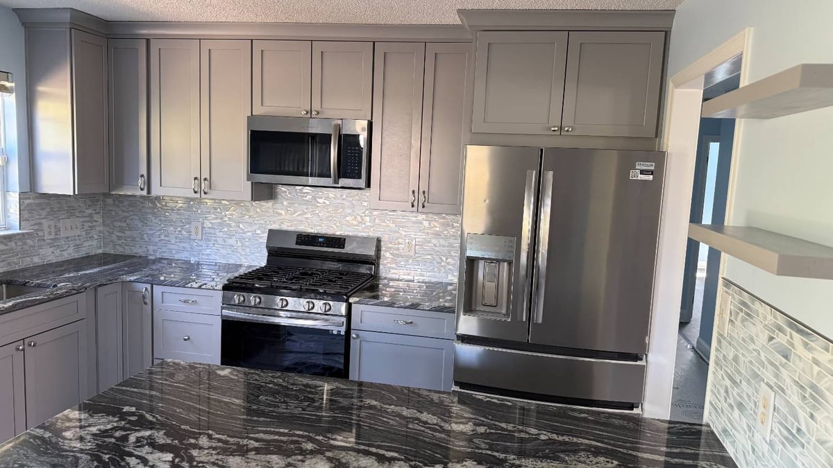 kitchen remodel with gas range and stone countertops by Carolina Signature Custom Homes in Aitken Charlotte NC-optimized
