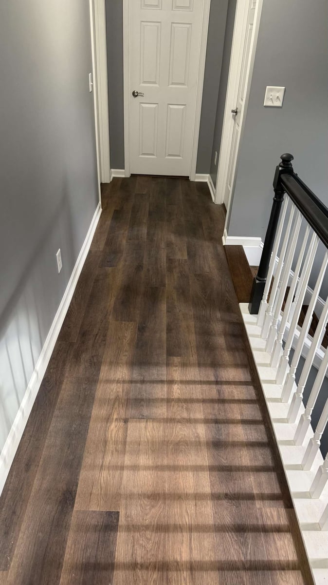 hallway flooring upgrade with durable wood-look planks in Mooresville NC by Carolina Signature Custom Homes-optimized