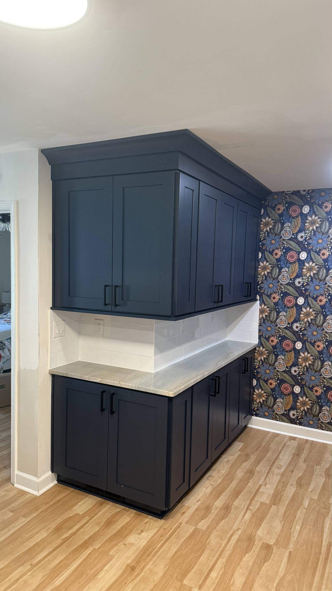 custom kitchen remodel featuring dark cabinets and quartz countertops in Higgins, NC by Carolina Signature Custom Homes custom kitchen remodel featuring dark cabinets and quartz countertops in Higgins, NC by Carolina Signature Custom Homes