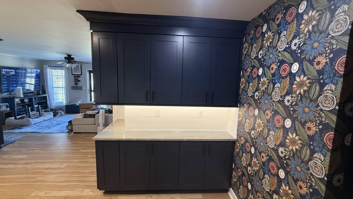 modern kitchen remodel with dark cabinets and tile backsplash in Higgins, NC by Carolina Signature Custom Homes-optimized