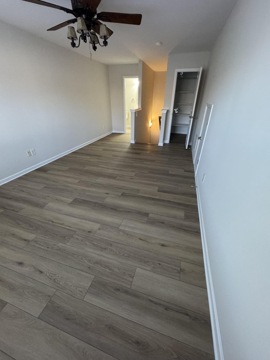 Carolina Signature Custom Homes renovated bonus room with new flooring and paint in Cornelius NC-optimized
