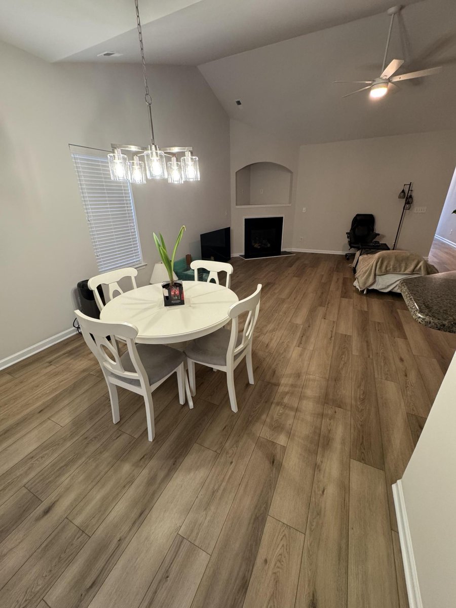dining space renovation with new flooring, painted walls, and trim by Carolina Signature Custom Homes in Cornelius, NC-optimized