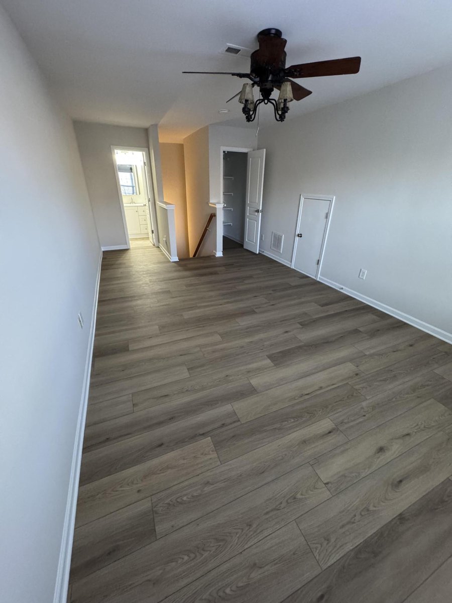 large open room remodel featuring wood-look floors by Carolina Signature Custom Homes in Cornelius NC-optimized