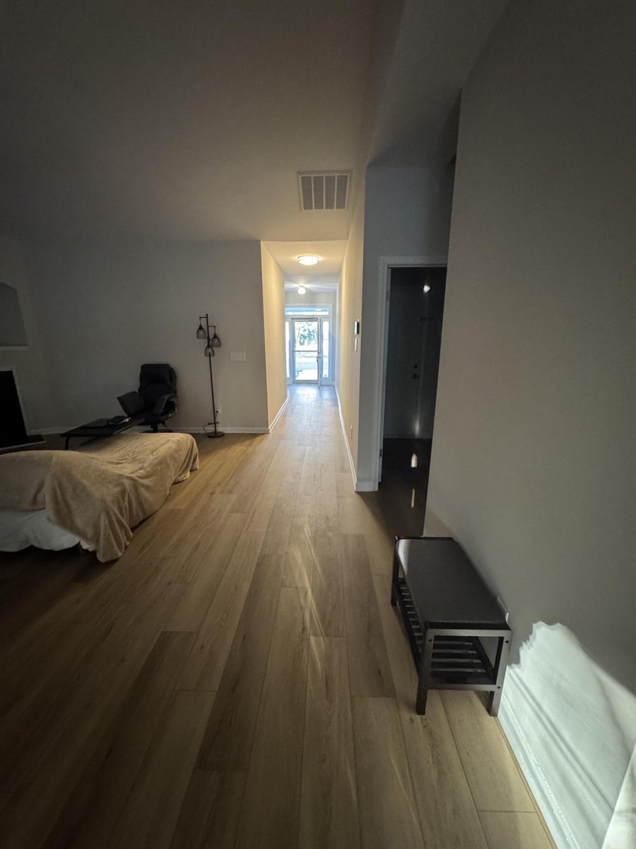 long interior hallway with updated floors and trim by Carolina Signature Custom Homes in Cornelius NC-optimized