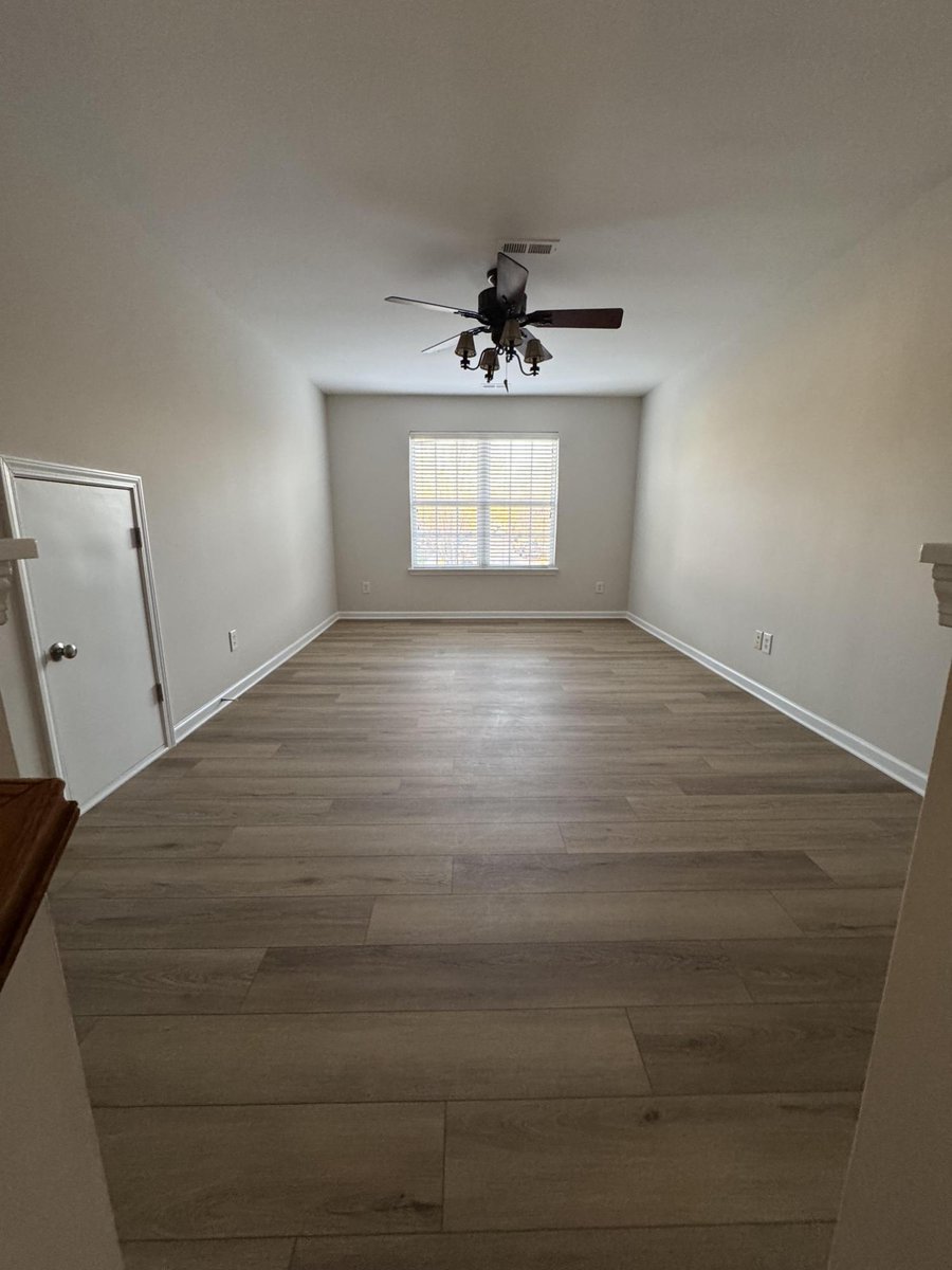 open living space renovation with updated flooring and trim in Cornelius NC by Carolina Signature Custom Homes-optimized