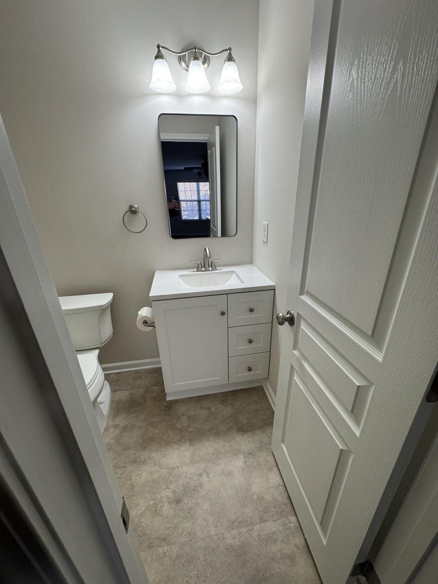 remodeled bathroom showcasing new trim and flooring in Cornelius NC by Carolina Signature Custom Homes-optimized
