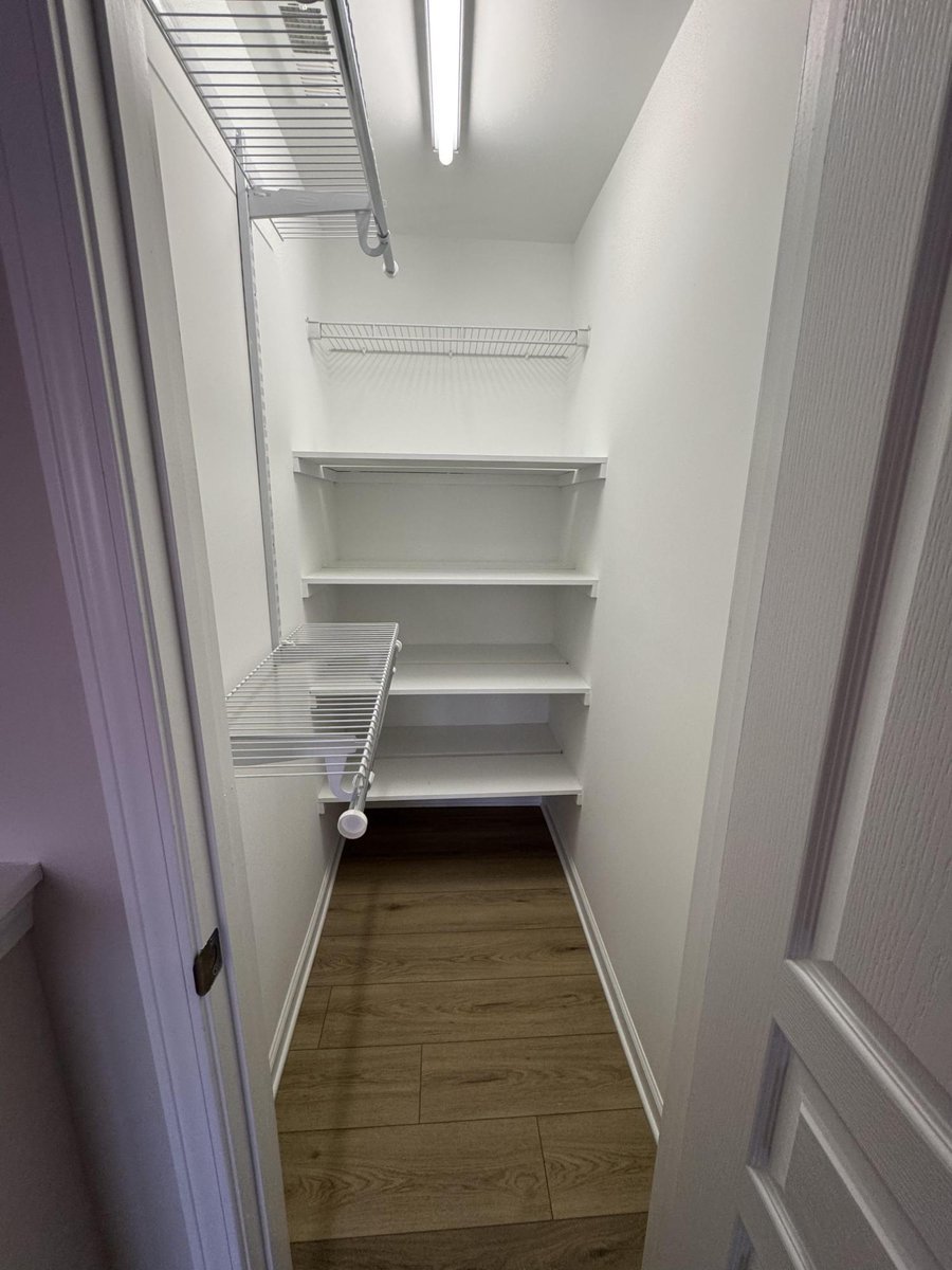 storage closet remodel featuring new shelves and floors in Cornelius NC by Carolina Signature Custom Homes-optimized