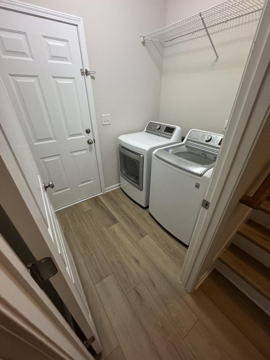 updated laundry area with modern flooring and trim by Carolina Signature Custom Homes in Cornelius NC-optimized