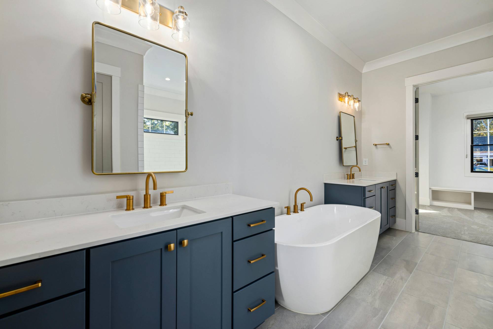 elegant bathroom renovation with soaking tub and tile flooring by Carolina Signature Custom Homes Troutman NC stock-optimized