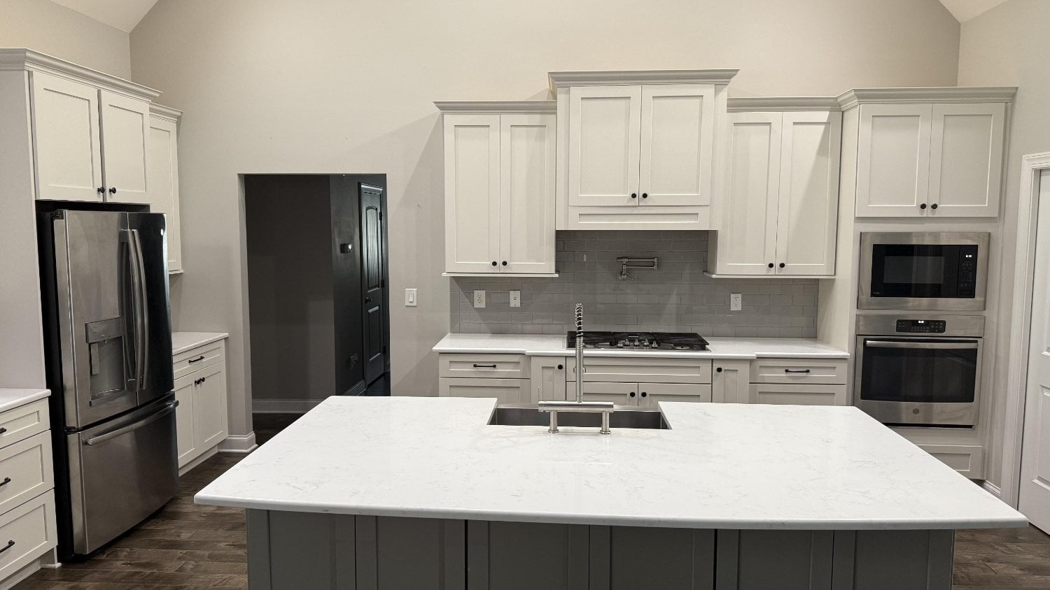 high-end kitchen remodel with island seating and modern finishes in Mt Ulla NC by Carolina Signature Custom Homes-optimized