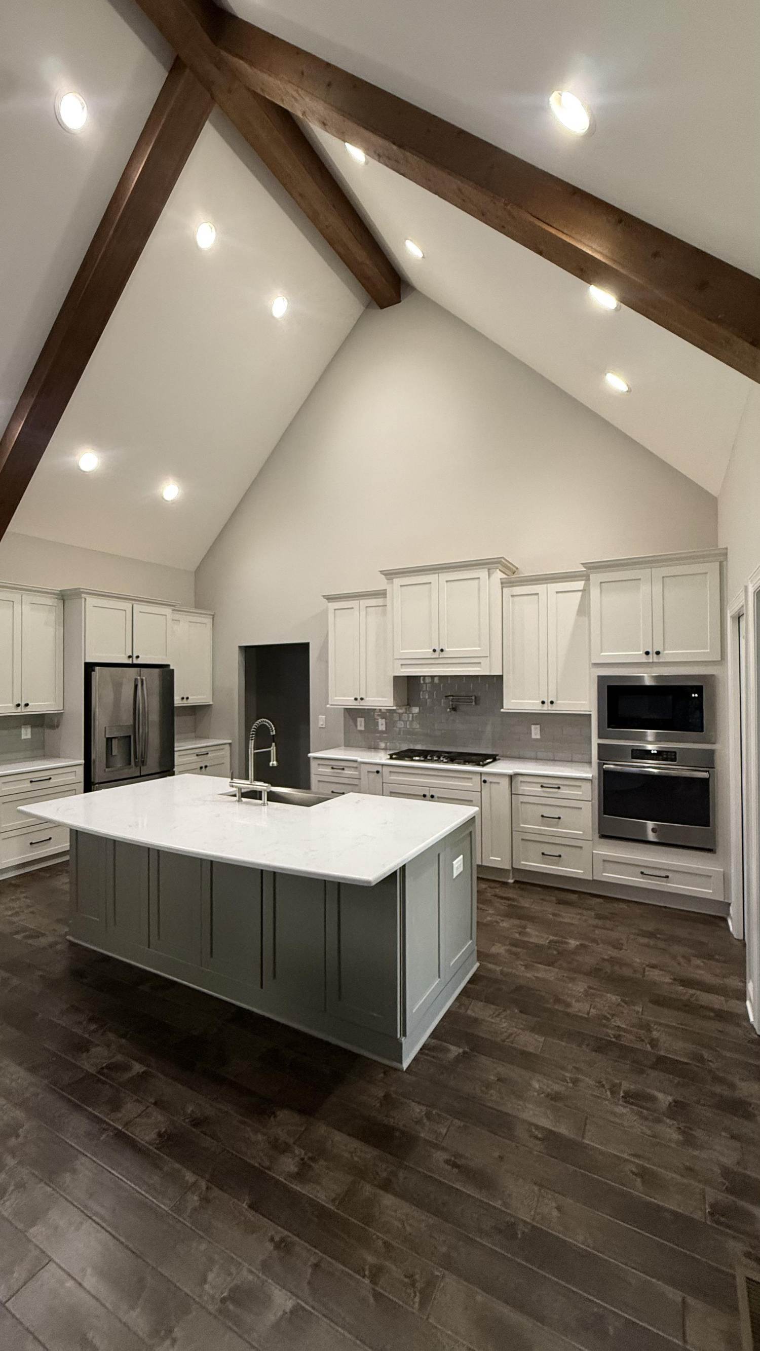 luxury kitchen with beam ceiling and quartz island in Mt Ulla NC by Carolina Signature Custom Homes-optimized