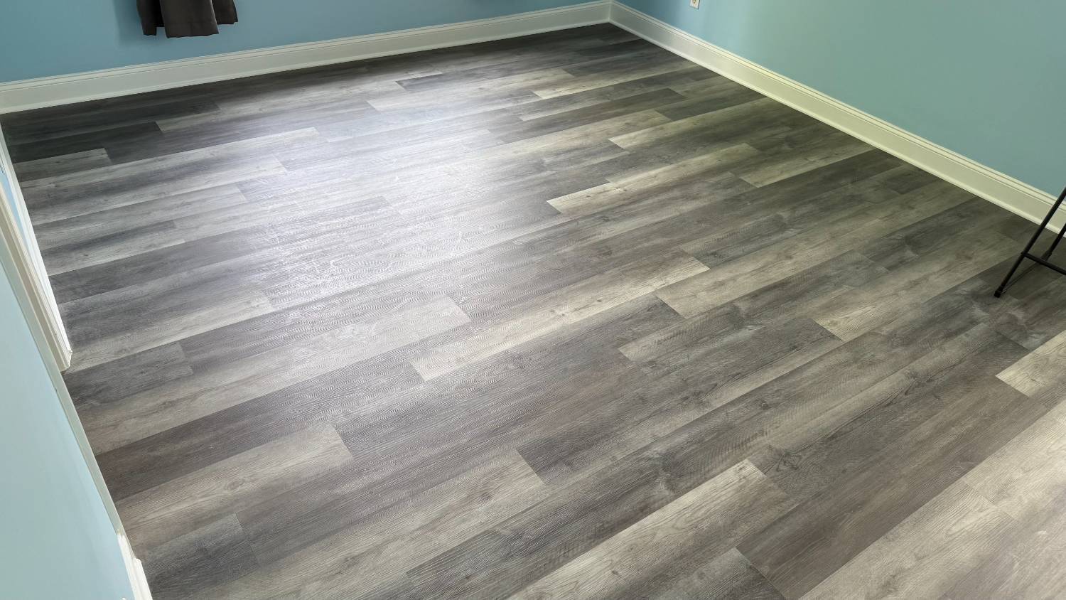 modern gray plank flooring installation in Aitken Charlotte NC by Carolina Signature Custom Homes-optimized