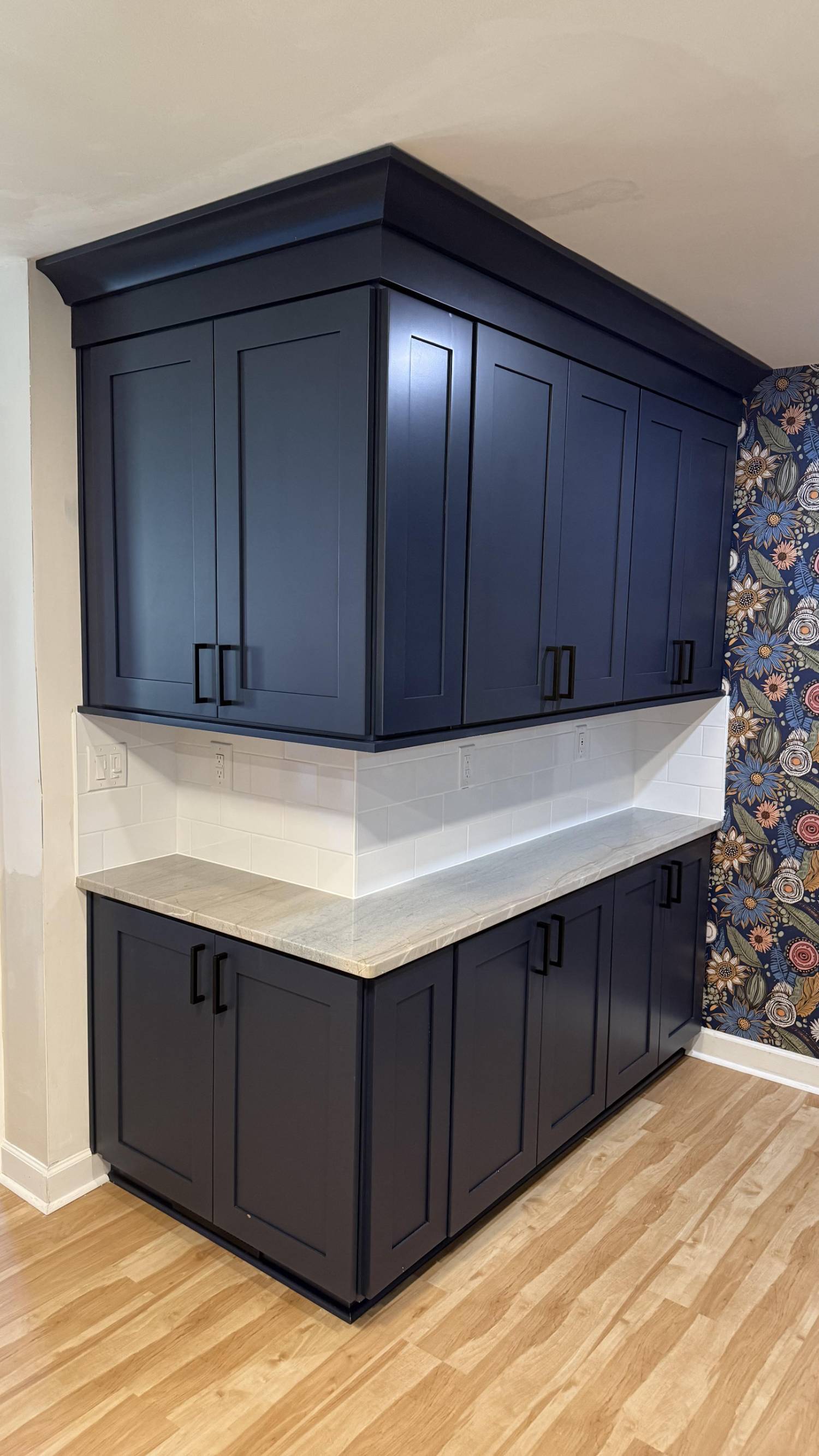 Carolina Signature Custom Homes kitchen cabinetry with white subway tile backsplash in Higgins, NC