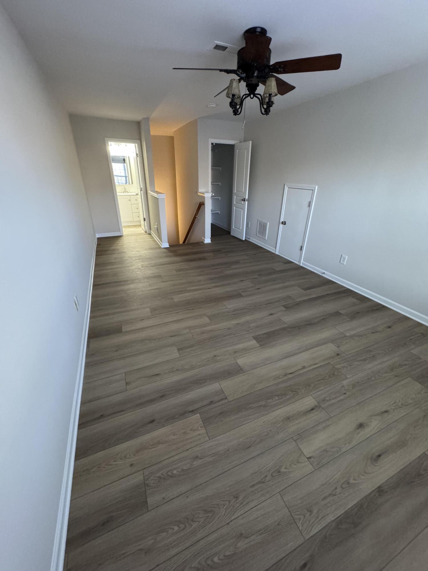 large open room remodel featuring wood-look floors by Carolina Signature Custom Homes in Cornelius NC-optimized